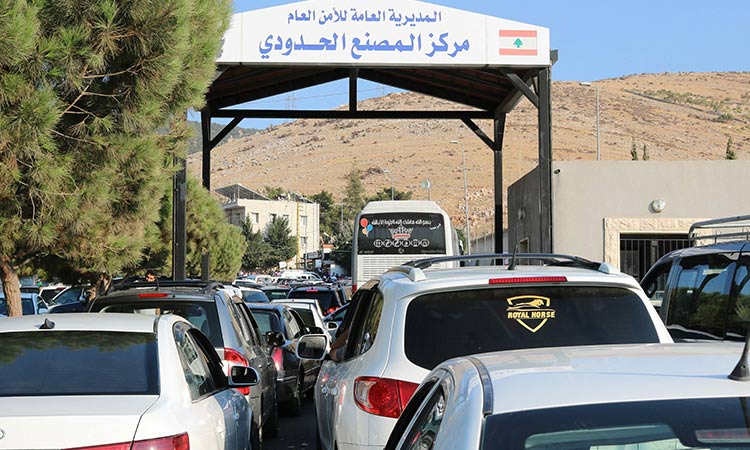 Families escaping Southern Lebanon due to Traffic congestion at the Syrian Border