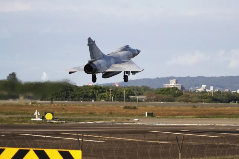 Taipei reports China has more than 90 ships circling Taiwan.