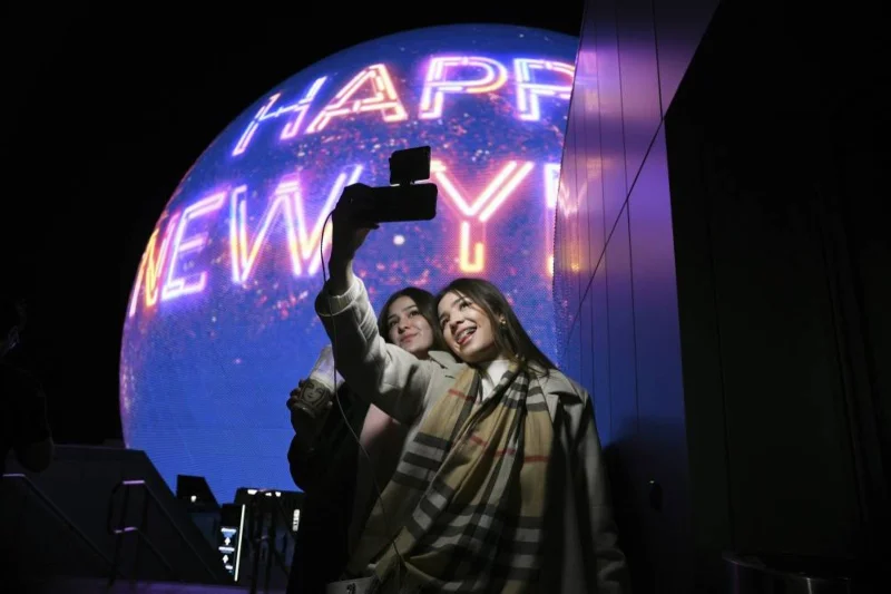 With Ice Plunges, Embraces, and Light Displays, the World Welcomes 2025